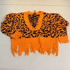 LU NYC Distressed Leopard Sweater
